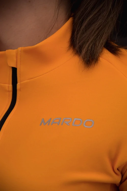 Bluza rowerowa damska hiszpańska pomarańcza - odblaskowe logo